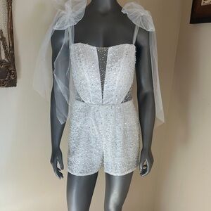 Hand Beaded Custom Designed White Beaded Romper with Sheer Tie Straps.